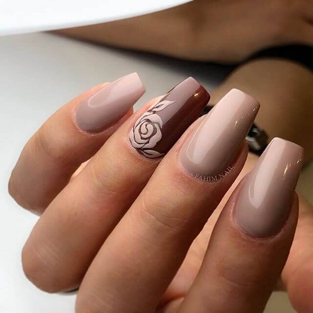 Nude Nail Idea: Contrasting Nude Nails Colors with a Rose Accent