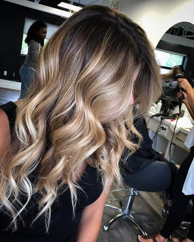Cool Frosted Blonde Hair with Heavy Highlights in Dark Hair