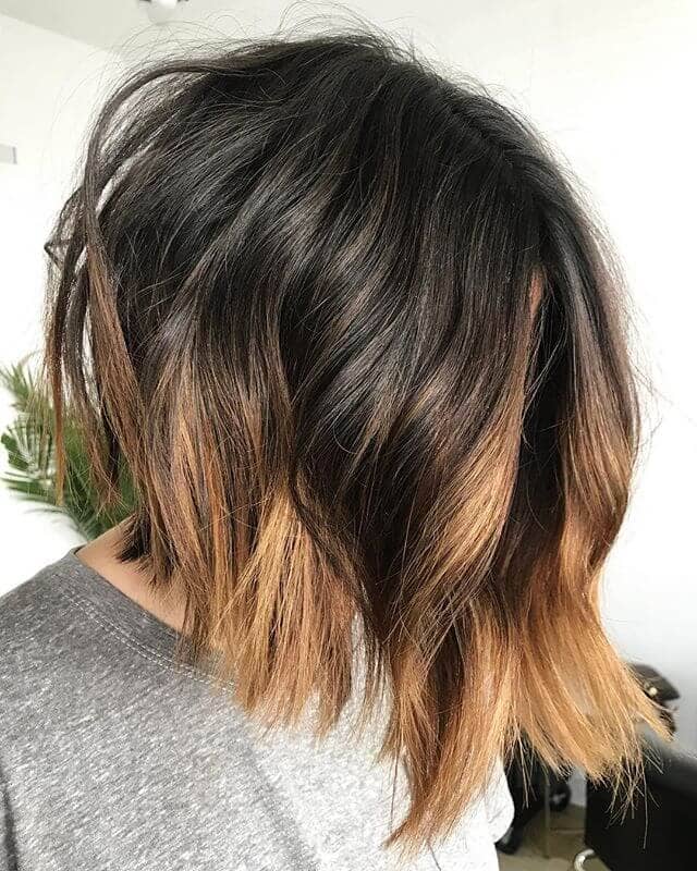 Short Bob Hairstyle with Copper Blonde Highlights