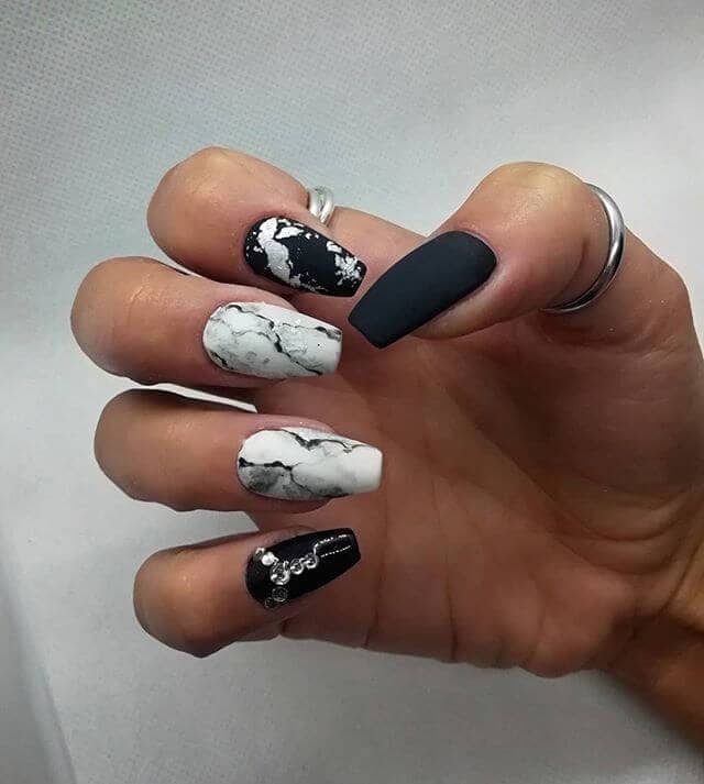 Edgy Matte Black Nails with Silver Accents
