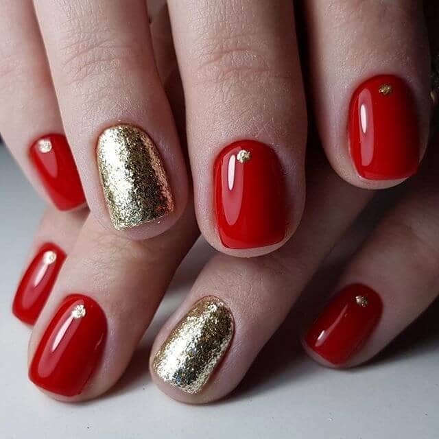 Gold Dots: A Touch of Glitter Goes a Long Way on Rose Gold Nail Designs