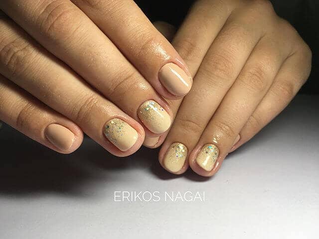 A Touch of Glitter Goes a Long Way on Rose Gold Nails