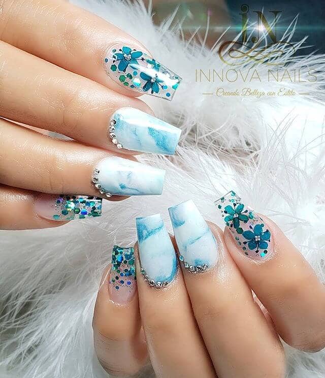 Translucent Glittery Blue Marble Nail Look