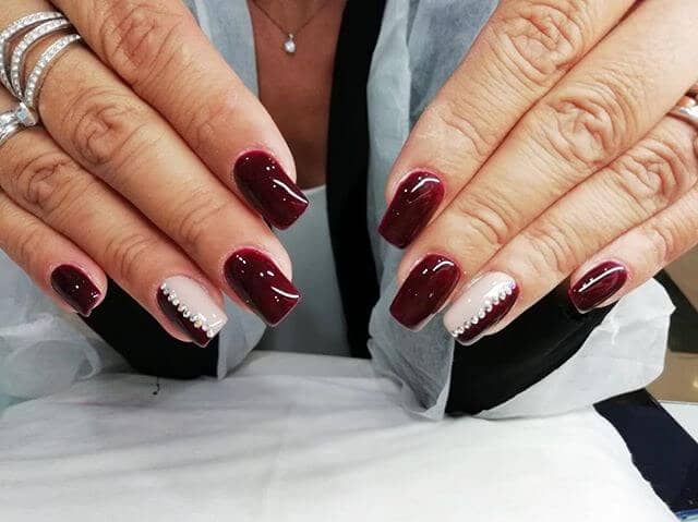 Burgundy Matte Nails with Rhinestones Down the Middle