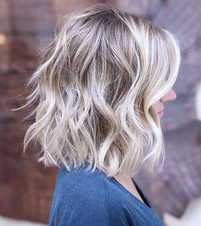 Flirty Ash Blond Highlights in Soft Waves