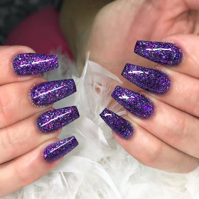 Magical Purple Glittery Galaxy Nails