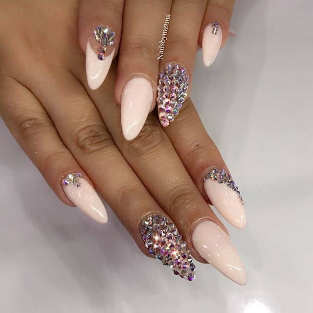 Soft Pink Nails with Gem Accents