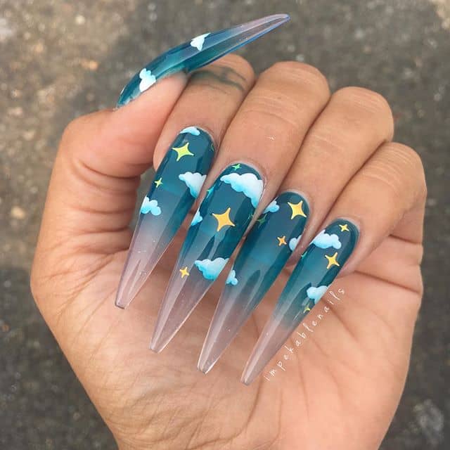 Cute Little White Stiletto Nails on a Blue Background