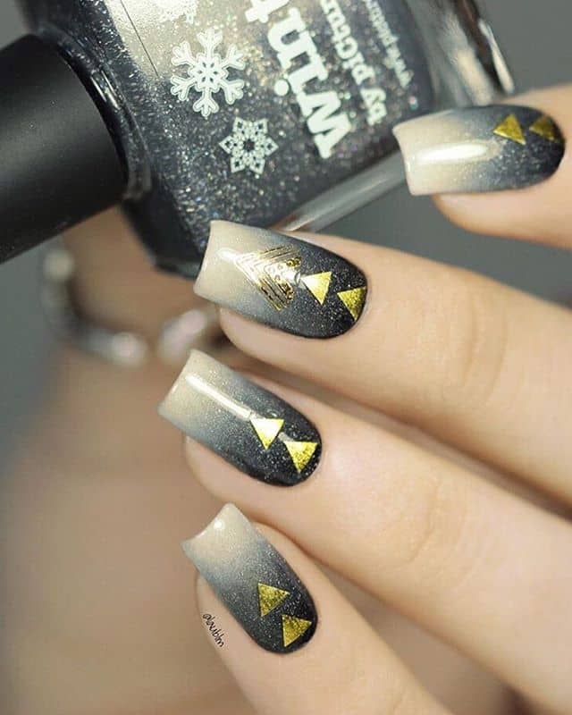 Squoval Arrowhead Black and Gold Nails