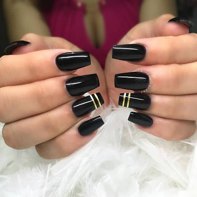 Glossy Black Nails With Stunning Gold Bands