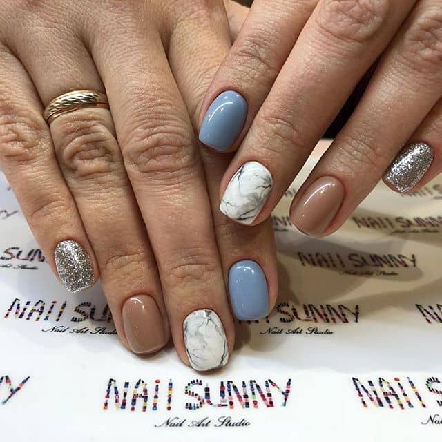 Design for Short Nails: Elegant Marble Nail Art with Blue and Silver Accents