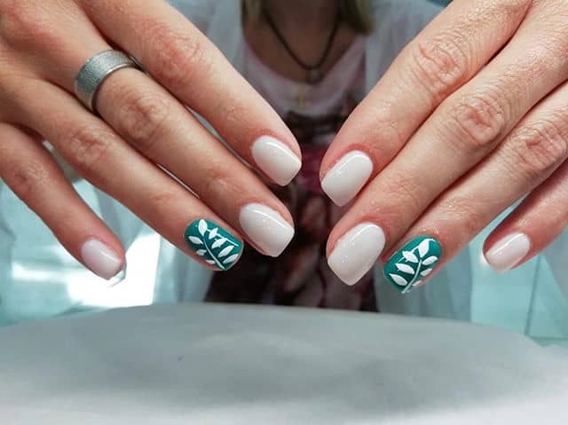 Glossy White Nails with Teal Accent