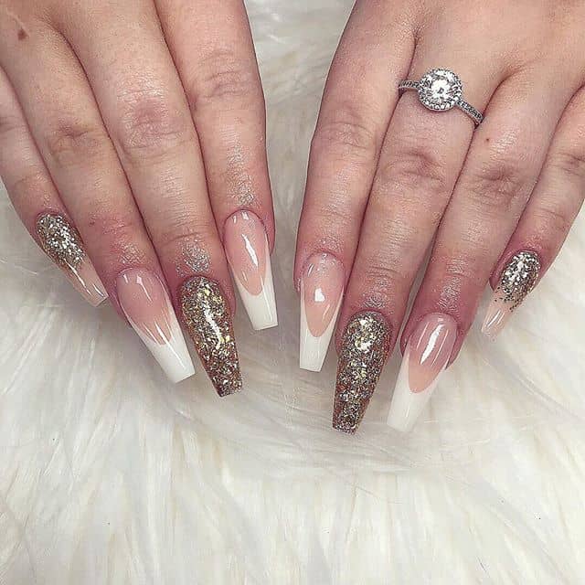 Short Stiletto Nails: Oblong French Manicure with Glitter Accents