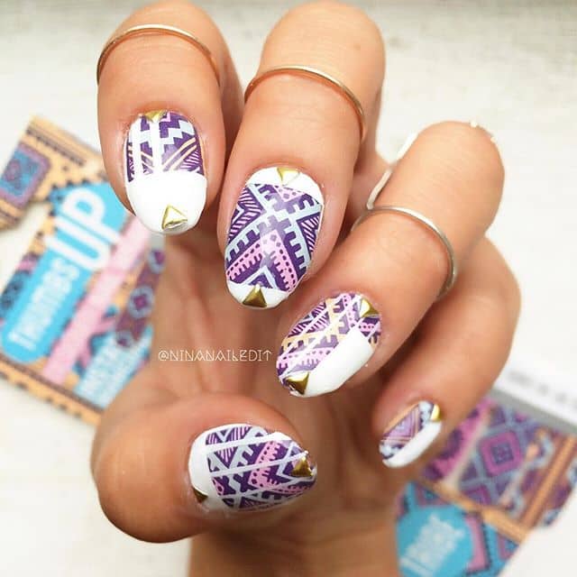 Tribal-Inspired White, Gold, and Purple Nails
