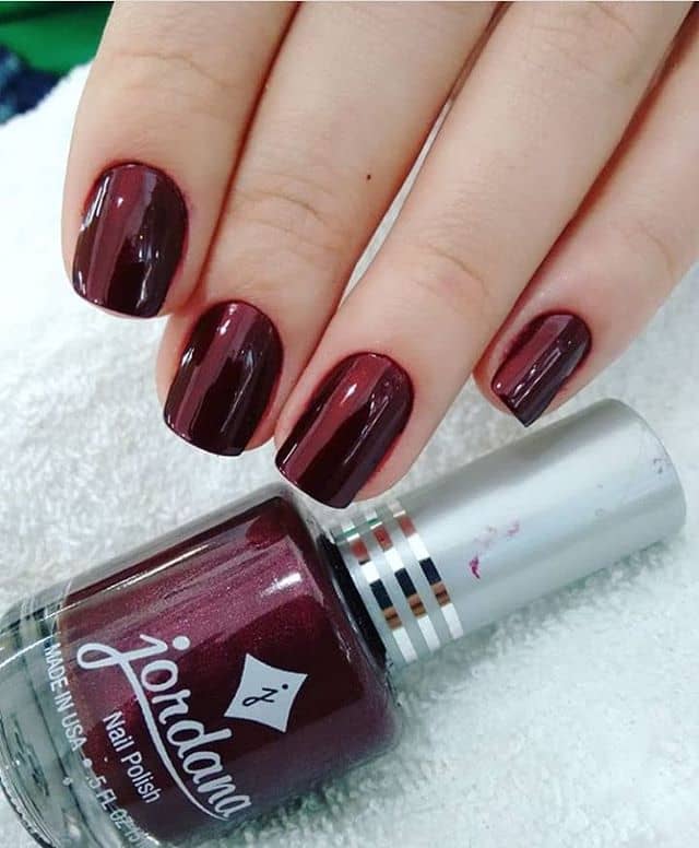 Nail Designs: Sparkle and Shine with Solid Deep Red Nails