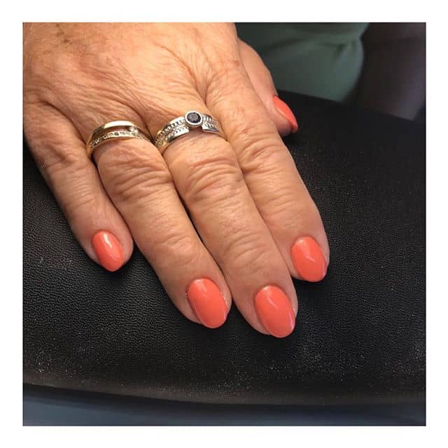 Orange, Black, and Silver Trio with Glitter Orange Nails