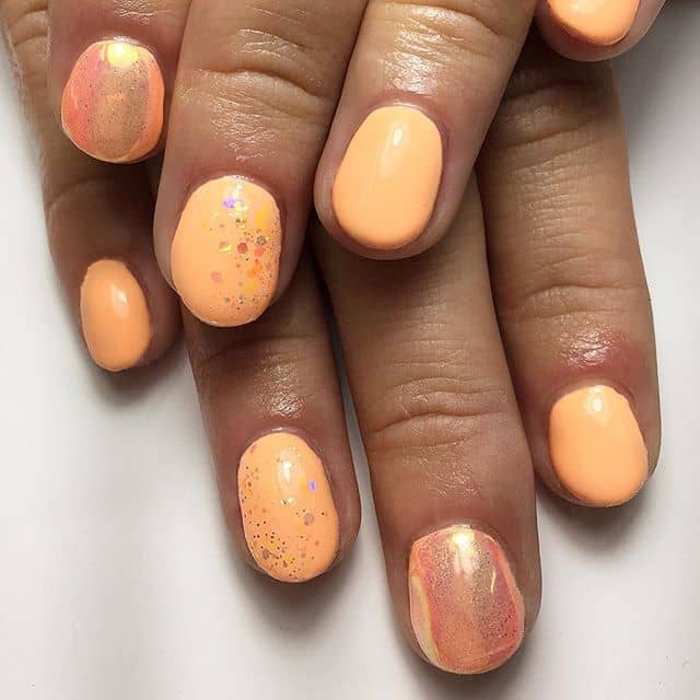 Glitter Dusted Pastel Orange Nails