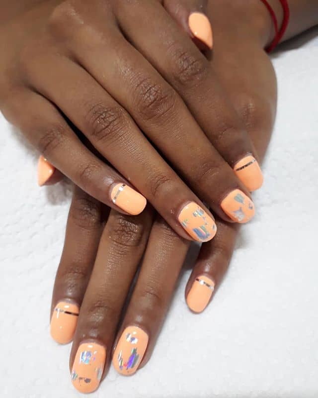 Pastel Orange Nails with Scratched Silver Accents