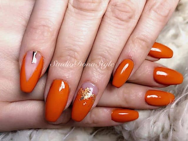 Luxurious Neon Orange Nail Designs and Gold Acrylics