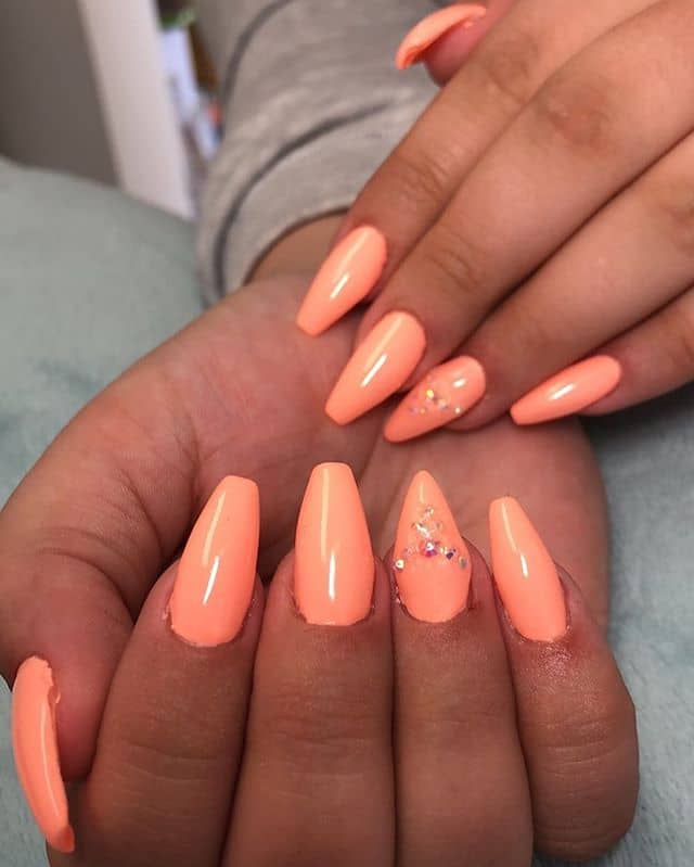 Light Pink Orange Nail Designs with Accented Ring Finger