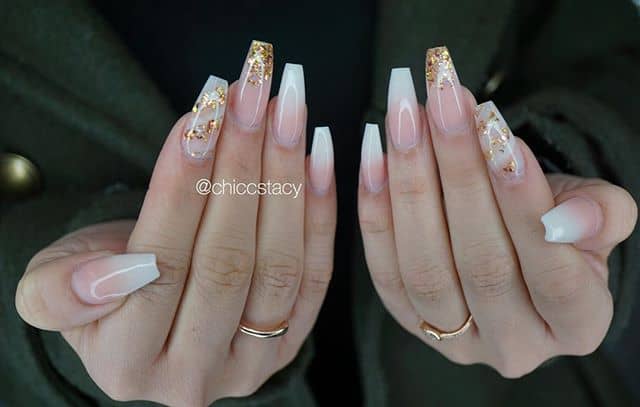 Chic and Unique Striped White and Gold Nails