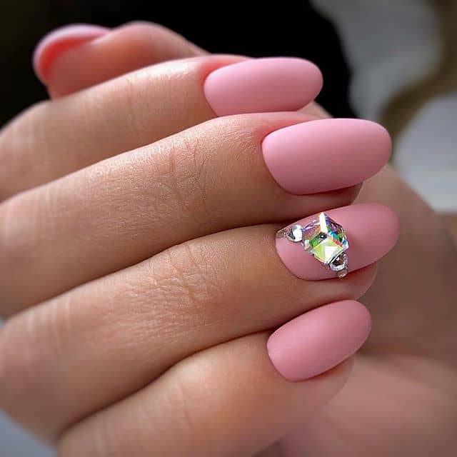 A Matte Pink Mani with a Large Gem