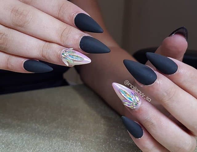 Ink Black Stiletto Nails with Lotus Flower Embellishment