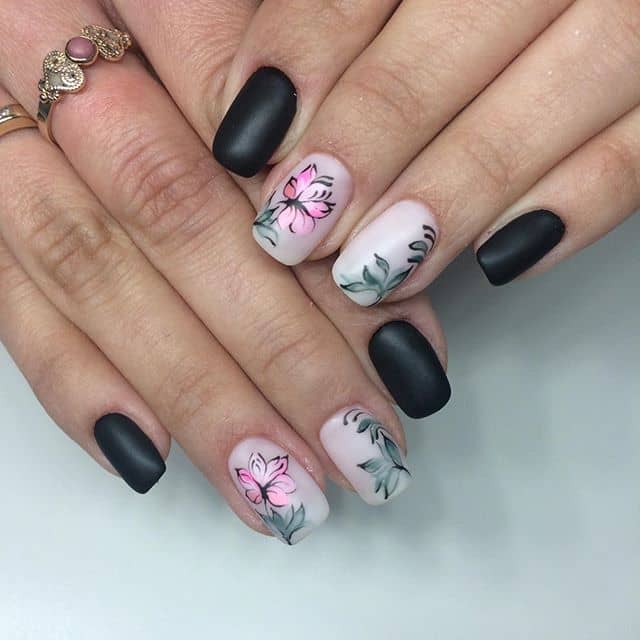 Edgy Matte Black Flower Nail Idea