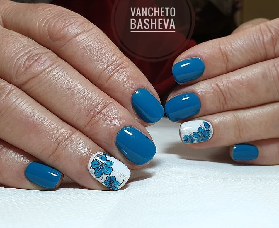 Vintage Blue Mani with Flowery White Accent Nails