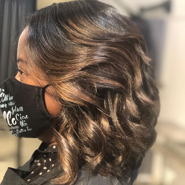 Curly Bob with Golden Highlights