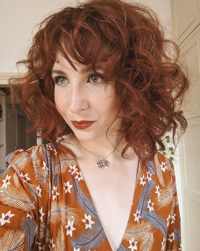 Curly Over-the-Shoulder Lob in Red