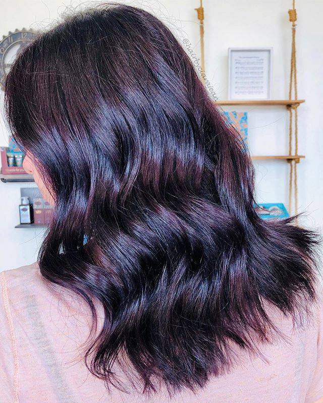  Mid-Length Brunette Waves with a Glossy Shine