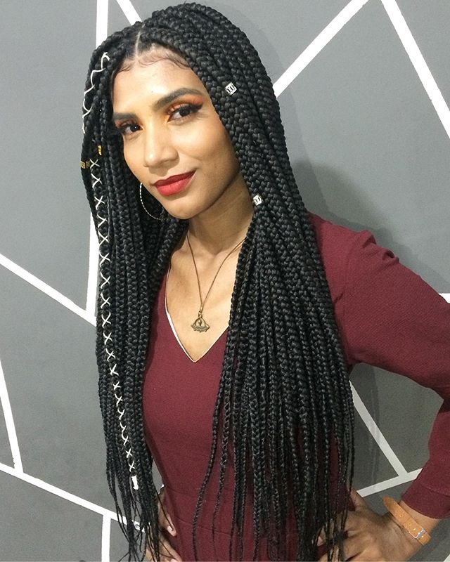  Waist-length braids with threads and beads