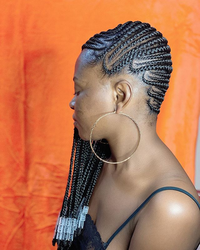 Deep Side Part Cornrows with Curve Appeal