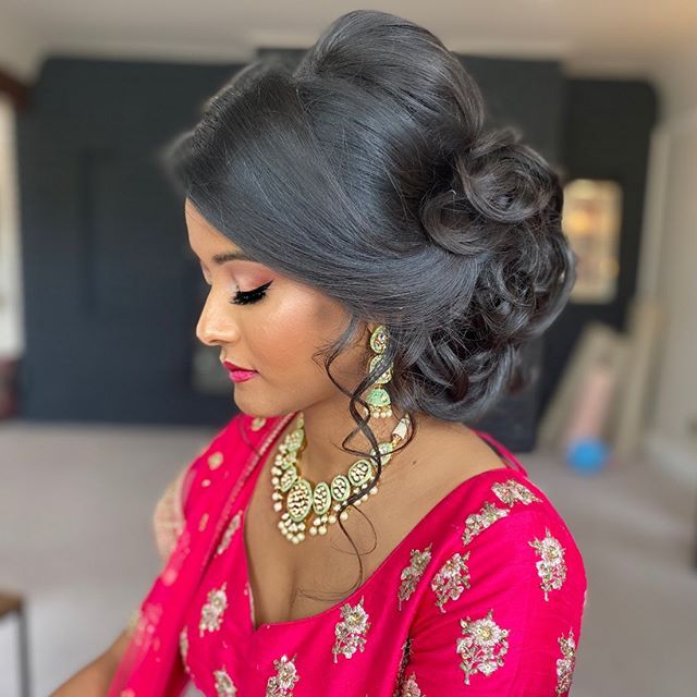 Chic Volume and Pinned Curls for Indian Brides