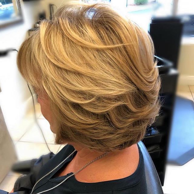 Modern Blonde Haircut With Layers