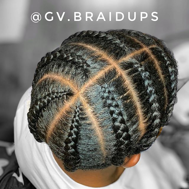  Eight Cornrows with Defining Middle Part