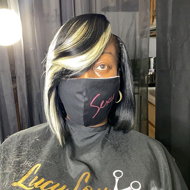 Asymmetrical Bob with Blonde Highlights