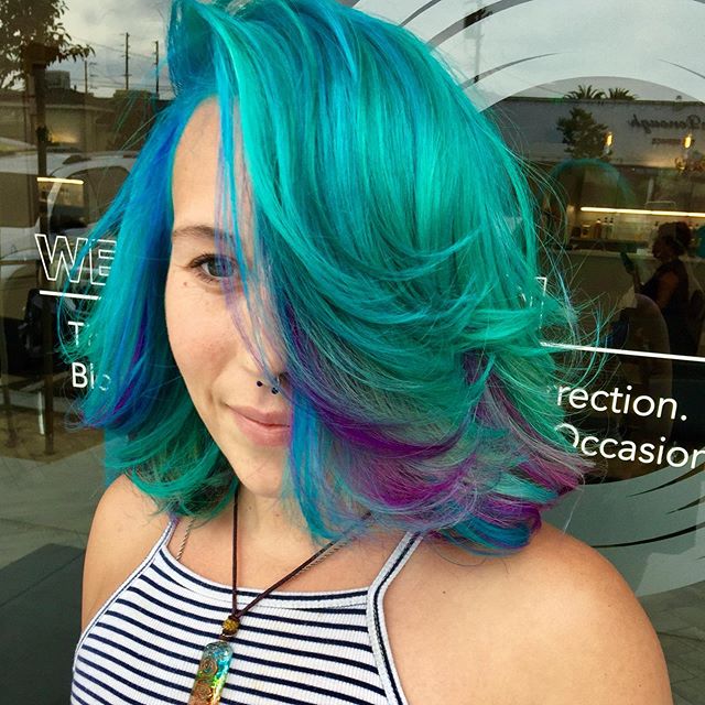 Striking Blue, Green, And Purple Waves