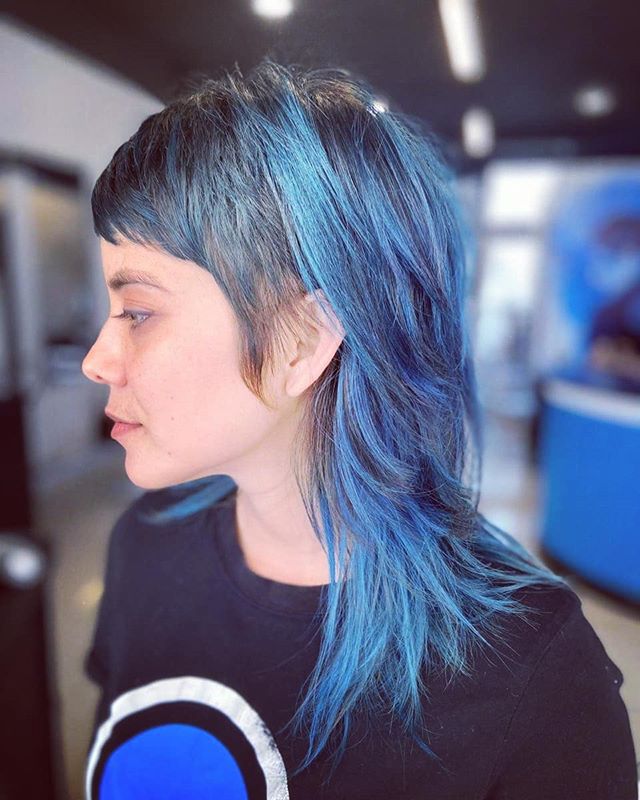 Edgy Modern Mullet with Blue Highlights and Fringe