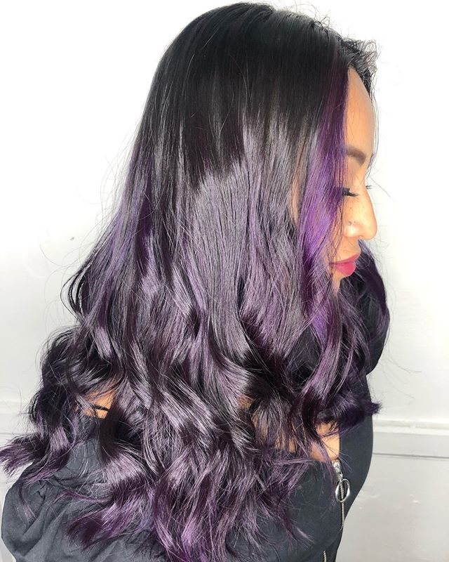  Raven-Colored Curls With Flashy Purple Bangs