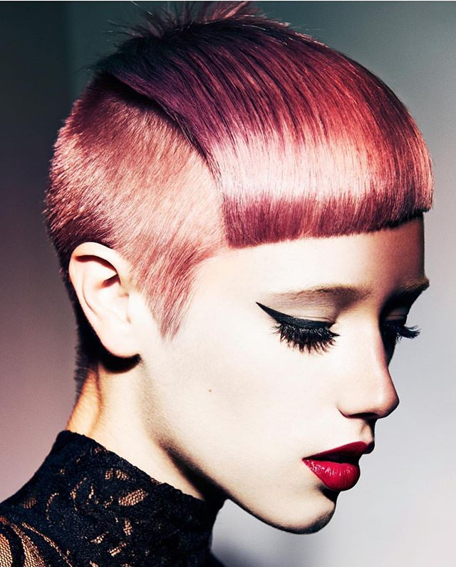 Edgy Berry-Colored Pixie with Bangs and Fade