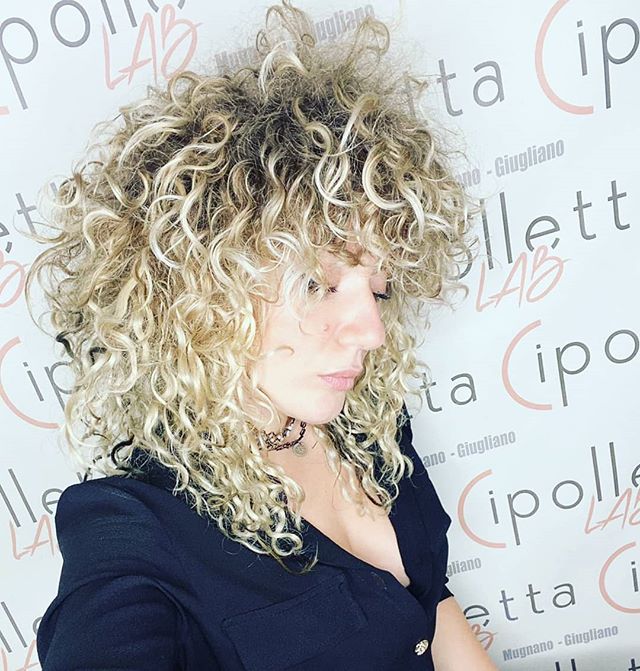 Modern Mullet with Bleached Curls