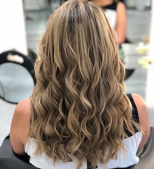 Cascading Curls with Ashy Blond Highlights