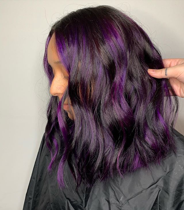 Sleek Dark Brown Hair Interwoven With Bright Purple for Natural Hair