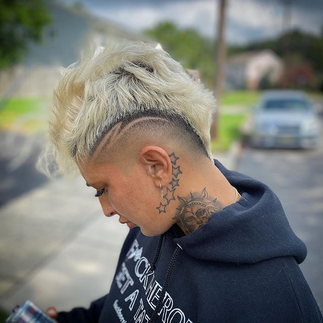 Edgy Bleached Mohawk with Shaved Details