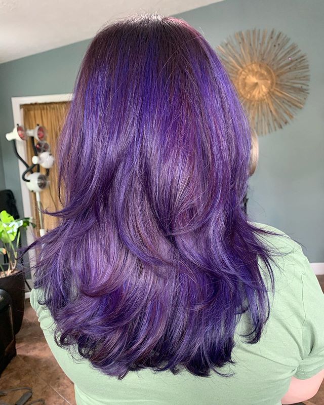 Layered Mid Length Purple Highlights