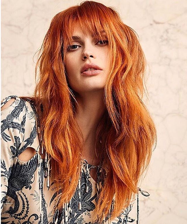 Tousled Red Waves with Curtain Bangs and Lots of Layers