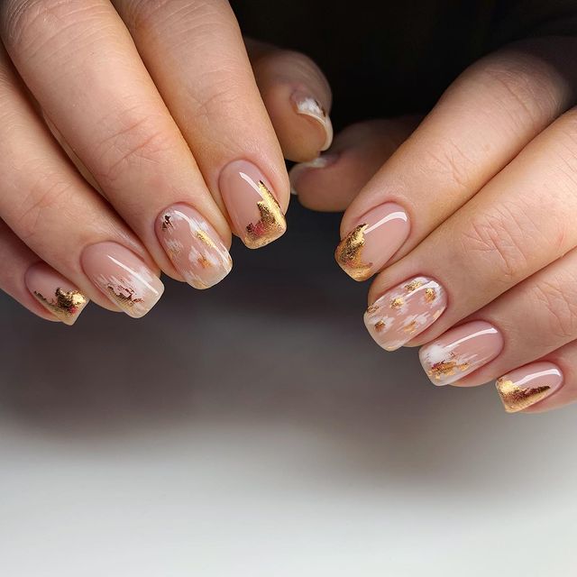 Short, Nude Nails with White and Gold Brush Strokes