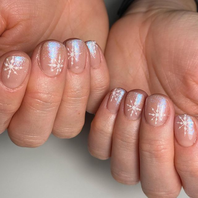 Short Nude Nails with Shimmer and Snowflakes